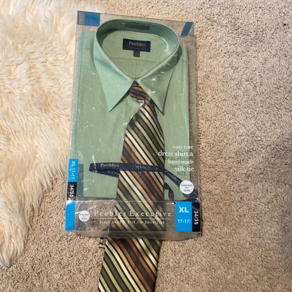 Men’s green dress shirt with tie.